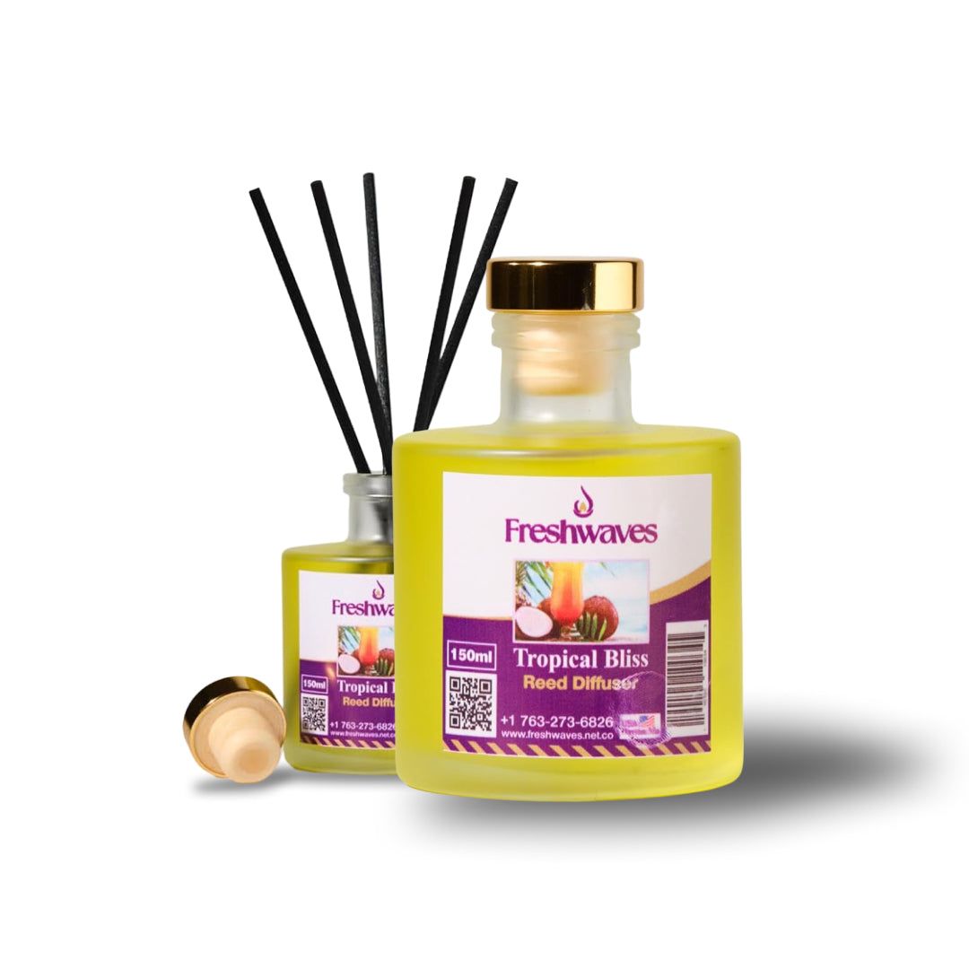 Tropical Bliss Diffuser with vibrant yellow oil in elegant glass bottle, black reeds, and gold cap for a fragrant home amb...